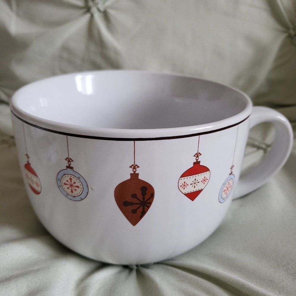 Oversized Holiday coffee mug by Design Pac with cute ornaments around the rim